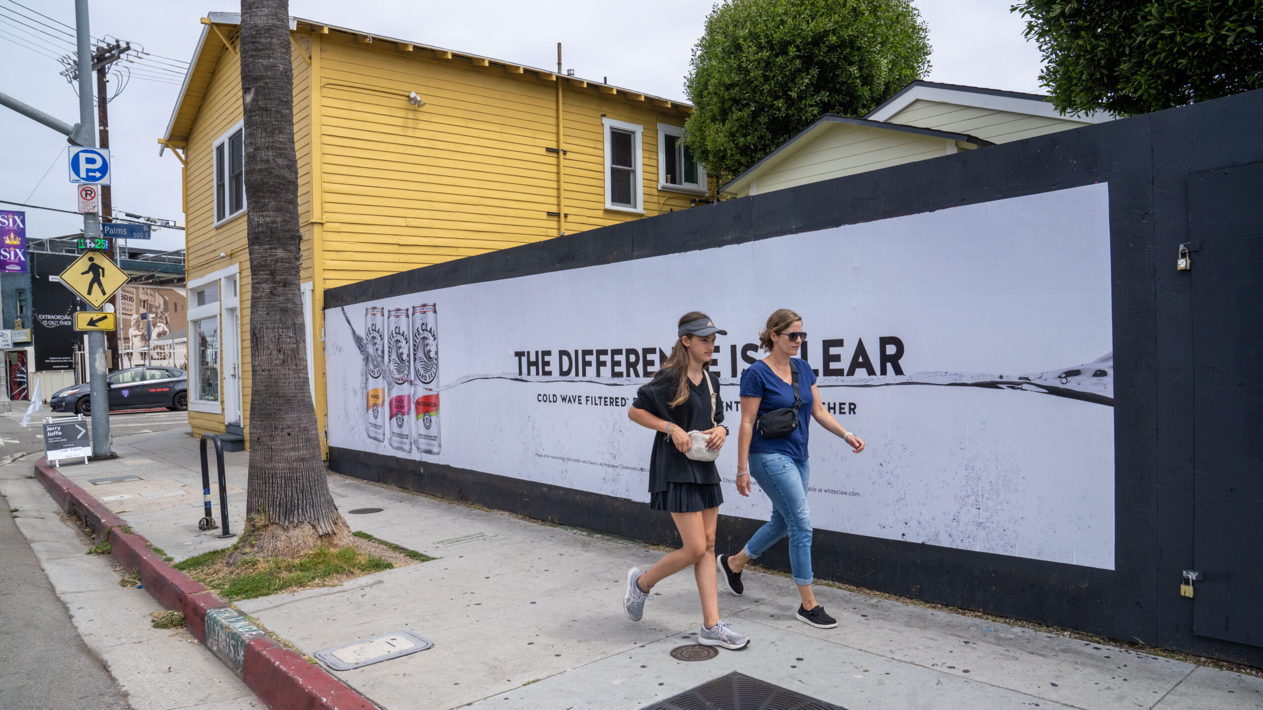 White Claw Outdoor Barricade Ads LA Abbot Kinney Blvd and Palms Blvd