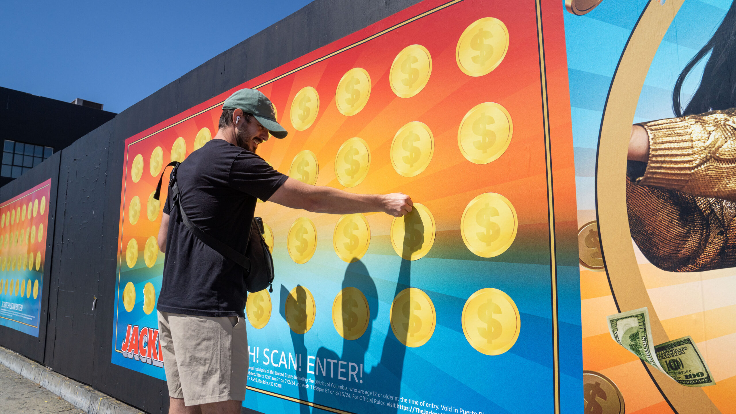 Amazon Prime Jackpot! Experiential Activations Barricade Man Scratching Off Ticket Los Angeles OOH Advertising Melrose Ave and N La Brea Ave